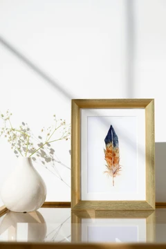 Image of a feather watercolor painting by Shayna Larsen, originals & prints available