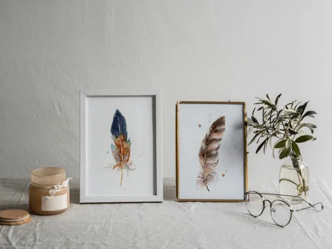 Image of a feather watercolor painting by Shayna Larsen, originals & prints available