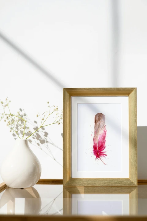 Image of a feather watercolor painting by Shayna Larsen, originals & prints available