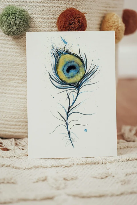 Image of a feather watercolor painting by Shayna Larsen, originals & prints available