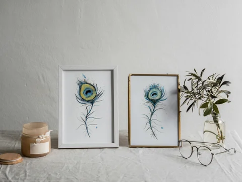 Image of a feather watercolor painting by Shayna Larsen, originals & prints available