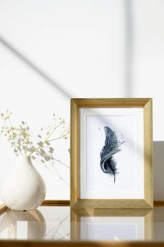 Image of a feather watercolor painting by Shayna Larsen, originals & prints available