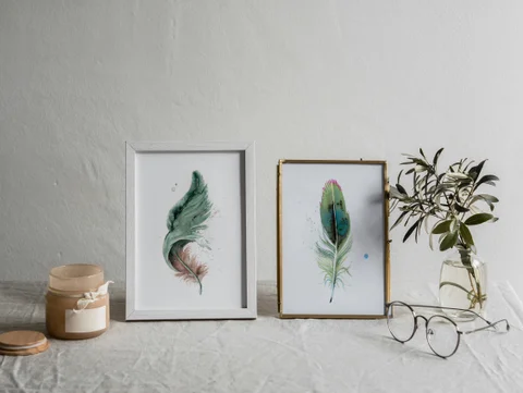 Image of a feather watercolor painting by Shayna Larsen, originals & prints available