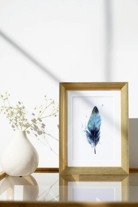 Image of a feather watercolor painting by Shayna Larsen, originals & prints available