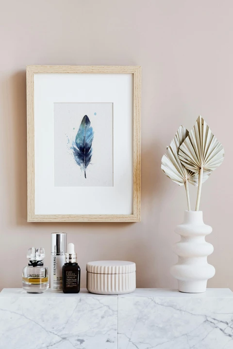 Image of a feather watercolor painting by Shayna Larsen, originals & prints available