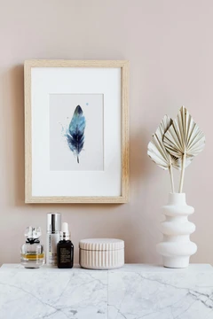 Image of a feather watercolor painting by Shayna Larsen, originals & prints available