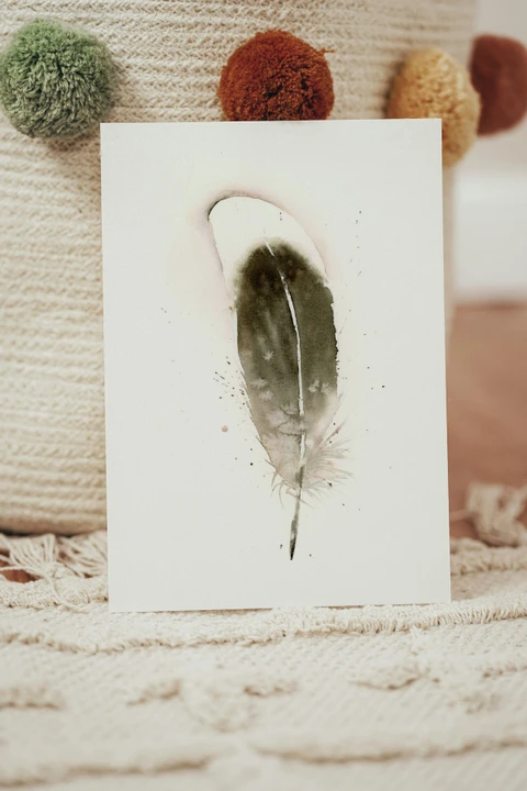 Image of a feather watercolor painting by Shayna Larsen, originals & prints available
