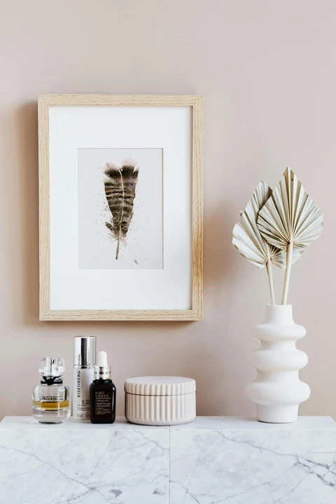 Image of a feather watercolor painting by Shayna Larsen, originals & prints available