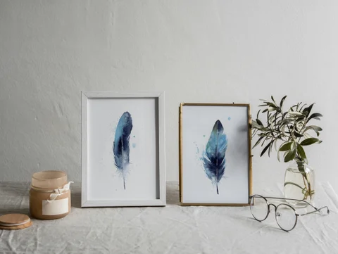 Image of a feather watercolor painting by Shayna Larsen, originals & prints available