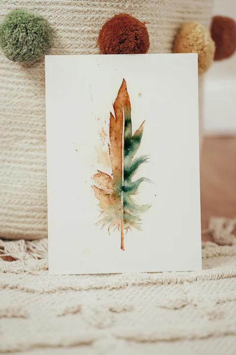 Image of a feather watercolor painting by Shayna Larsen, originals & prints available