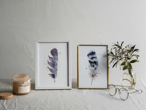 Image of a feather watercolor painting by Shayna Larsen, originals & prints available