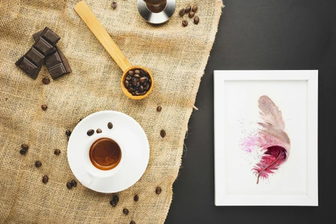 Image of a feather watercolor painting by Shayna Larsen, originals & prints available