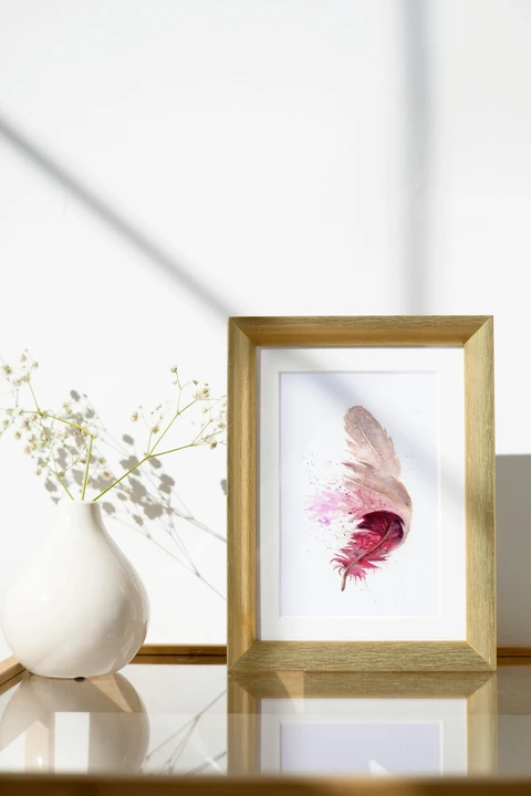Image of a feather watercolor painting by Shayna Larsen, originals & prints available
