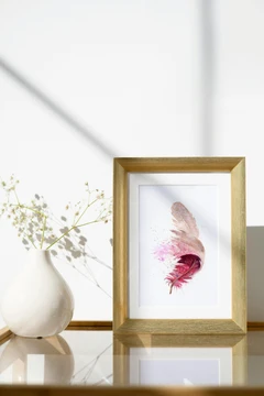 Image of a feather watercolor painting by Shayna Larsen, originals & prints available