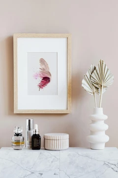 Image of a feather watercolor painting by Shayna Larsen, originals & prints available