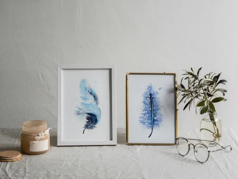 Image of a feather watercolor painting by Shayna Larsen, originals & prints available