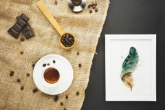 Image of a feather watercolor painting by Shayna Larsen, originals & prints available