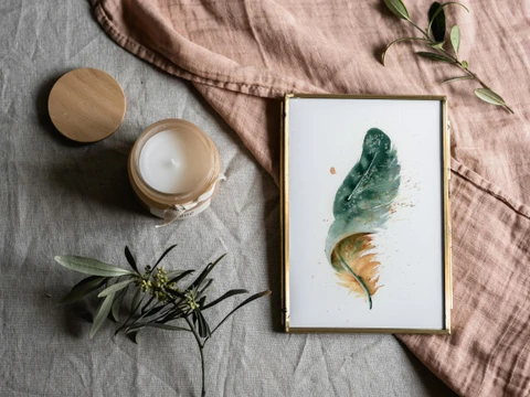 Image of a feather watercolor painting by Shayna Larsen, originals & prints available