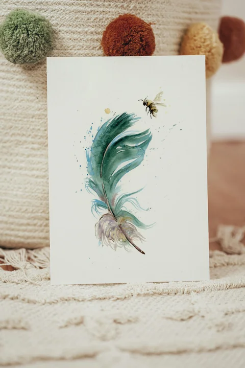 Image of a feather watercolor painting by Shayna Larsen, originals & prints available