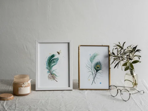 Image of a feather watercolor painting by Shayna Larsen, originals & prints available