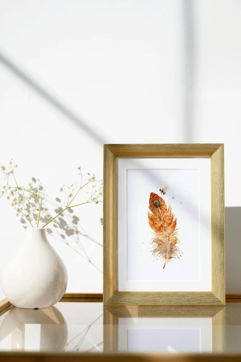 Image of a feather watercolor painting by Shayna Larsen, originals & prints available