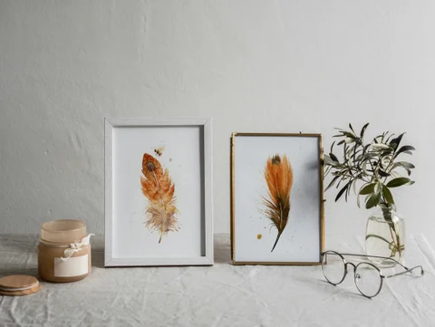 Image of a feather watercolor painting by Shayna Larsen, originals & prints available