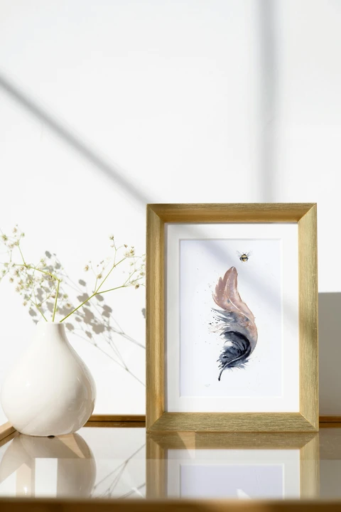 Image of a feather watercolor painting by Shayna Larsen, originals & prints available