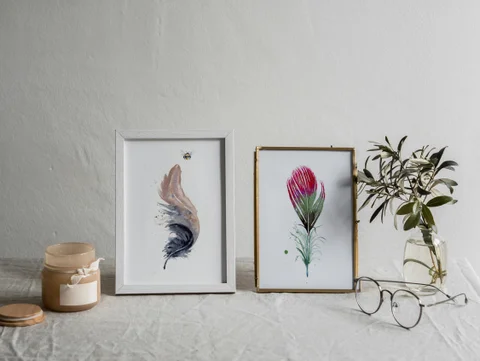 Image of a feather watercolor painting by Shayna Larsen, originals & prints available