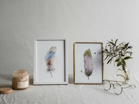 Image of a feather watercolor painting by Shayna Larsen, originals & prints available