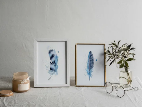 Image of a feather watercolor painting by Shayna Larsen, originals & prints available