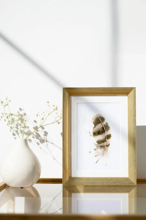 Image of a feather watercolor painting by Shayna Larsen, originals & prints available