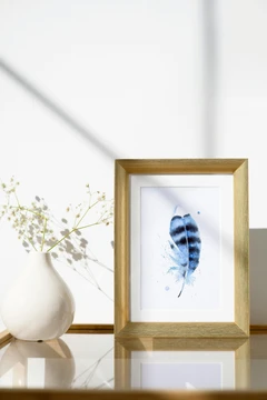 Image of a feather watercolor painting by Shayna Larsen, originals & prints available