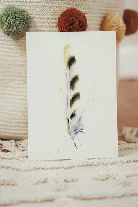 Image of a feather watercolor painting by Shayna Larsen, originals & prints available
