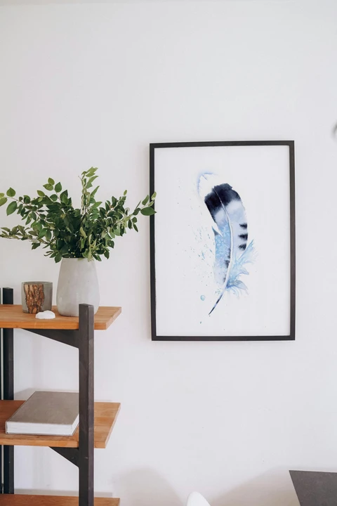 Image of a feather watercolor painting by Shayna Larsen, originals & prints available