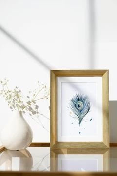 Image of a feather watercolor painting by Shayna Larsen, originals & prints available