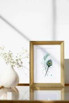 Image of a feather watercolor painting by Shayna Larsen, originals & prints available