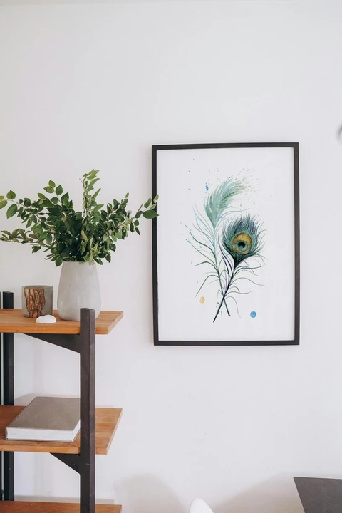 Image of a feather watercolor painting by Shayna Larsen, originals & prints available
