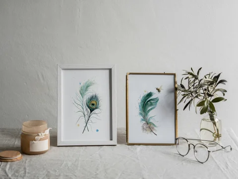 Image of a feather watercolor painting by Shayna Larsen, originals & prints available