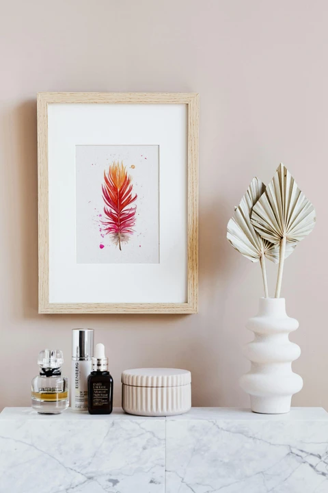 Image of a feather watercolor painting by Shayna Larsen, originals & prints available