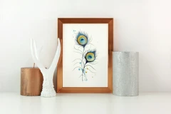 Image of a feather watercolor painting by Shayna Larsen, originals & prints available