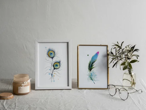 Image of a feather watercolor painting by Shayna Larsen, originals & prints available