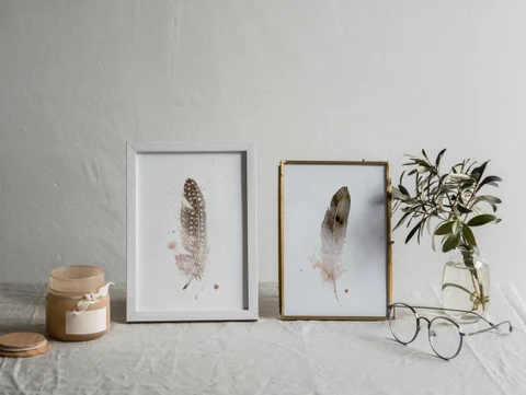 Image of a feather watercolor painting by Shayna Larsen, originals & prints available
