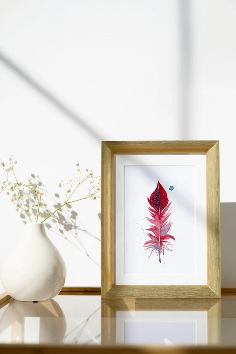Image of a feather watercolor painting by Shayna Larsen, originals & prints available