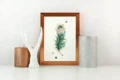 Image of a feather watercolor painting by Shayna Larsen, originals & prints available