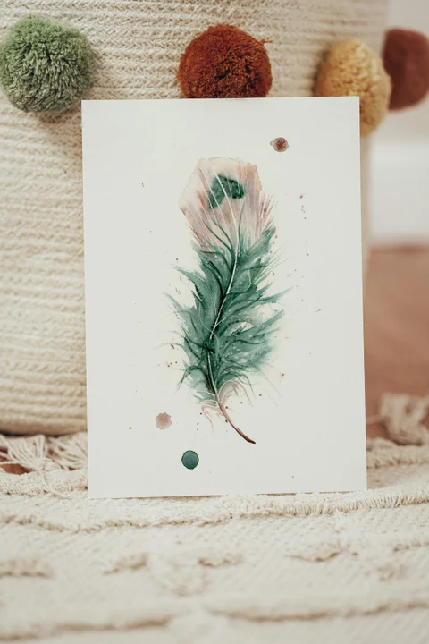 Image of a feather watercolor painting by Shayna Larsen, originals & prints available