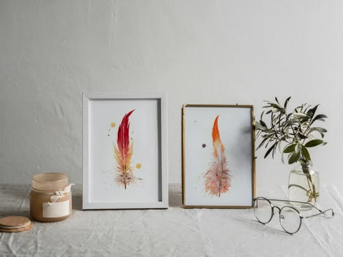 Image of a feather watercolor painting by Shayna Larsen, originals & prints available