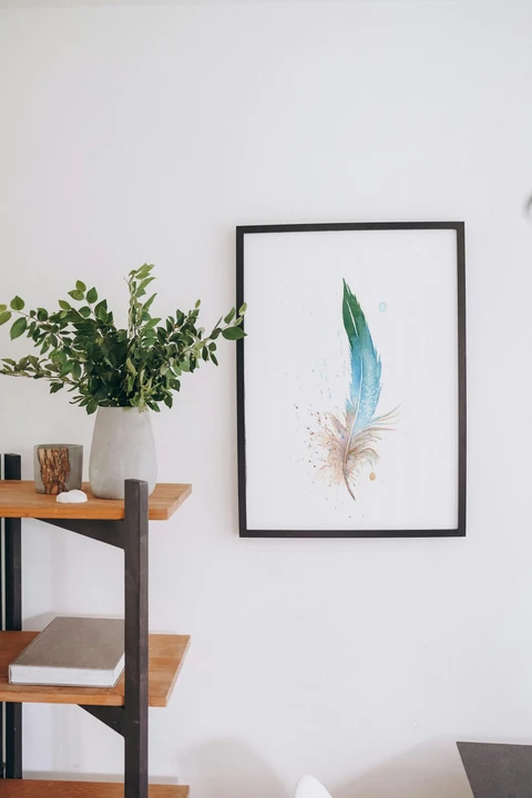 Image of a feather watercolor painting by Shayna Larsen, originals & prints available