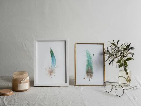 Image of a feather watercolor painting by Shayna Larsen, originals & prints available
