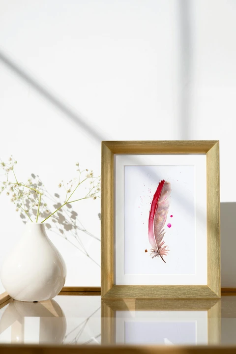 Image of a feather watercolor painting by Shayna Larsen, originals & prints available