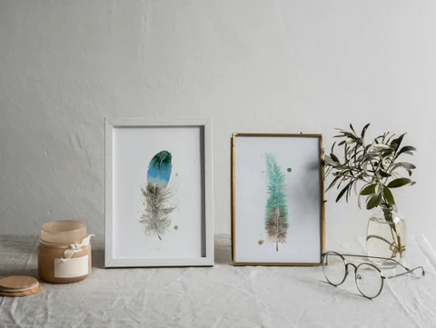 Image of a feather watercolor painting by Shayna Larsen, originals & prints available